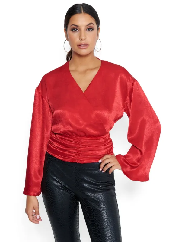 Bell Sleeve Surplice Top sold by Bebe