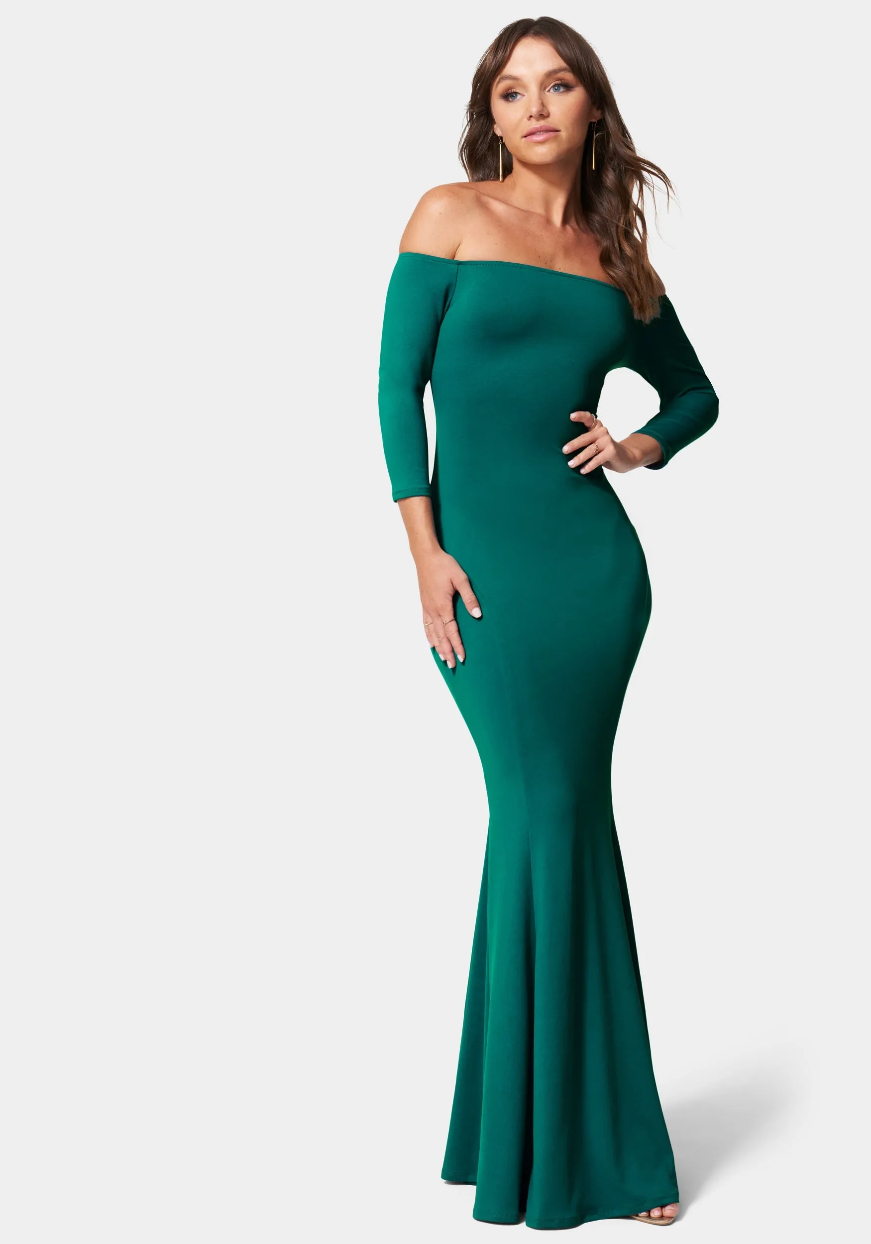 Off Shoulder Knit Mermaid Gown sold by Bebe