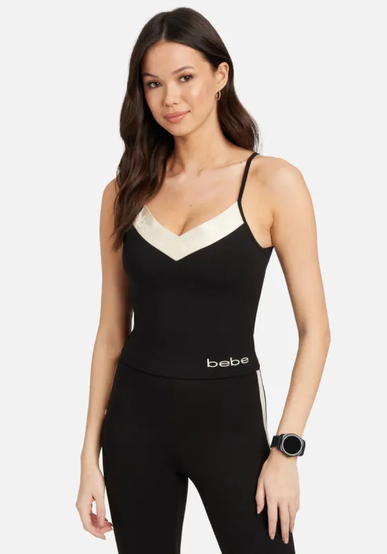 Bebe Rubberized Contrast Elastic Top sold by Bebe