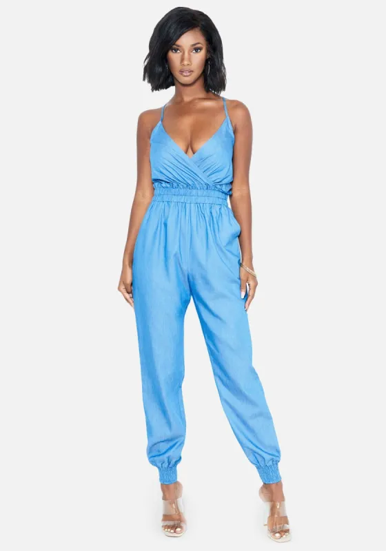 Smocked Waist Denim Jumpsuit sold by Bebe