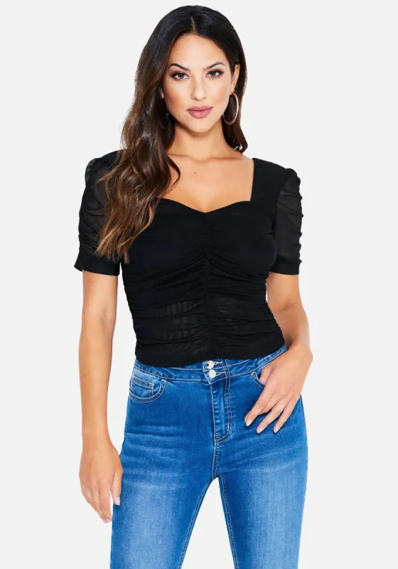 4 Way Mesh Knit Top sold by Bebe