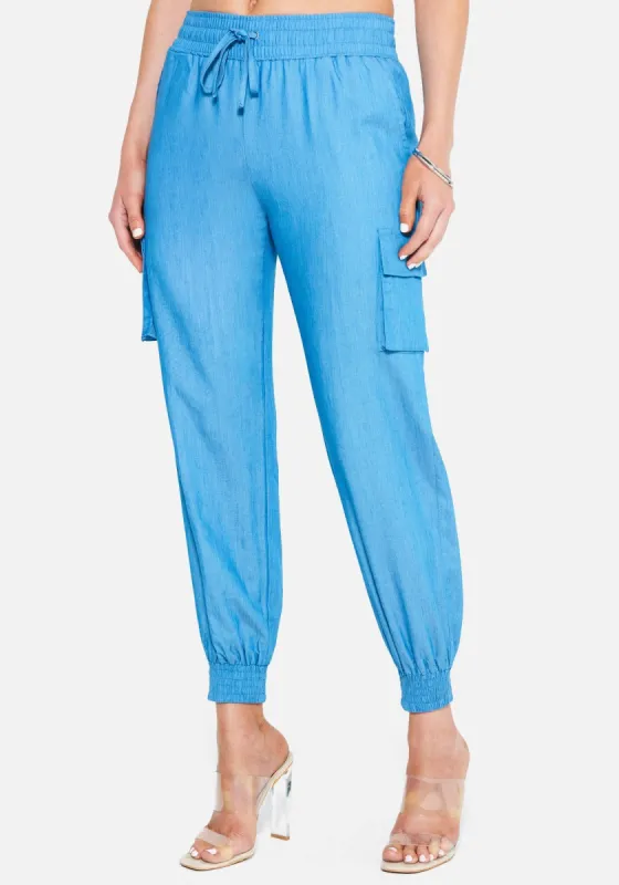 Chambray Smocked Cargo Joggers sold by Bebe
