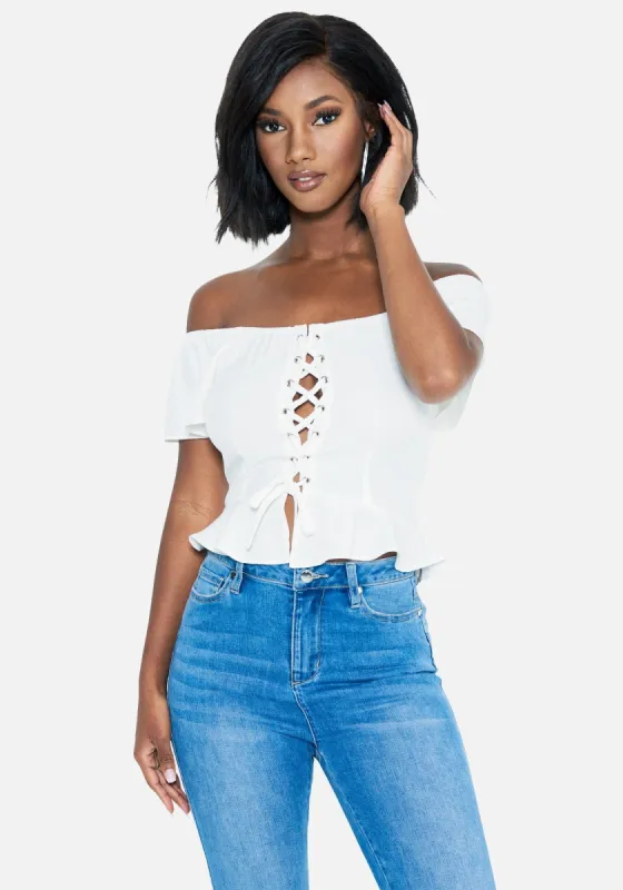 Chambray Lace Front Top sold by Bebe