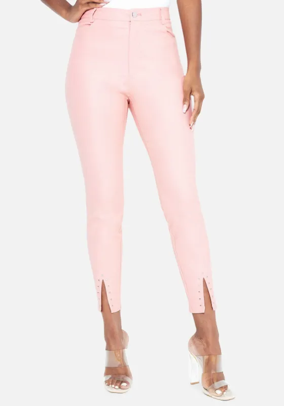 Stud Detail Slit Front Coated Pants sold by Bebe