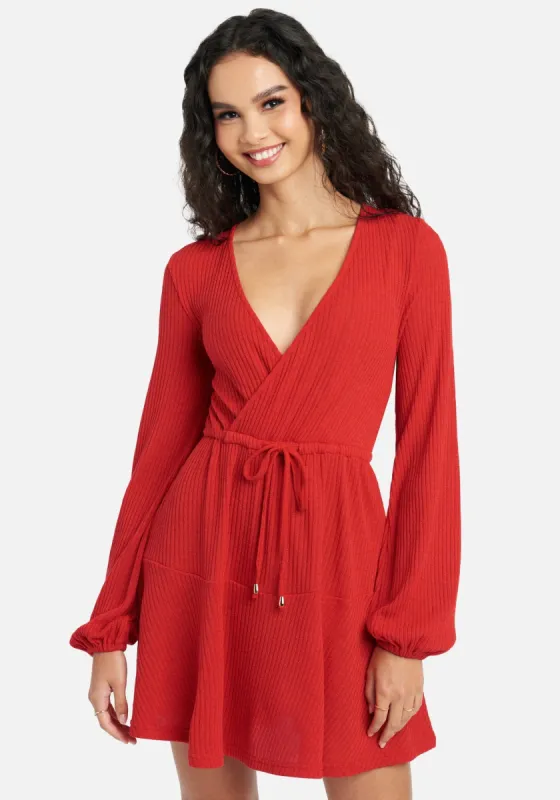 Surplice Neck Flare Knit Dress sold by Bebe