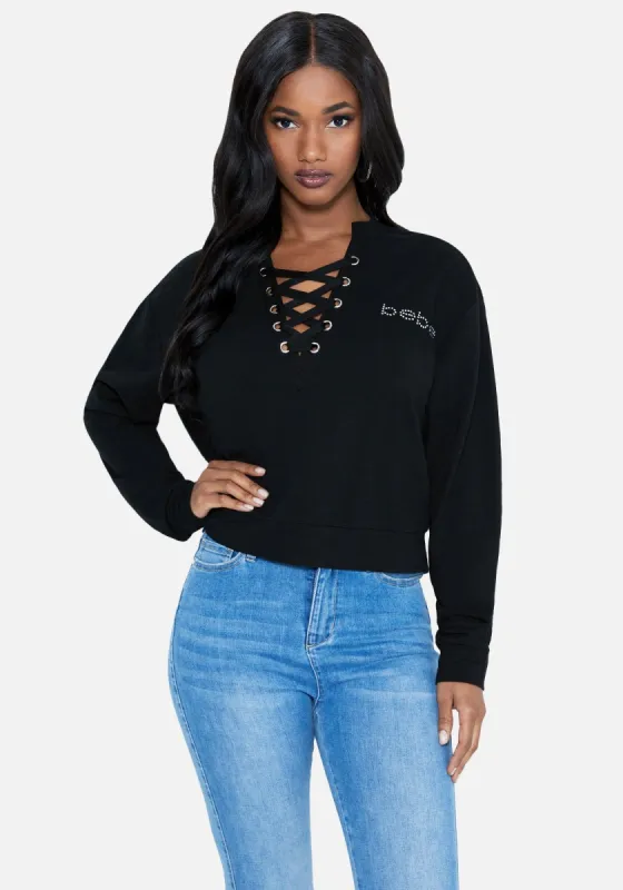 Bebe Logo Lace Up Sweatshirt sold by Bebe