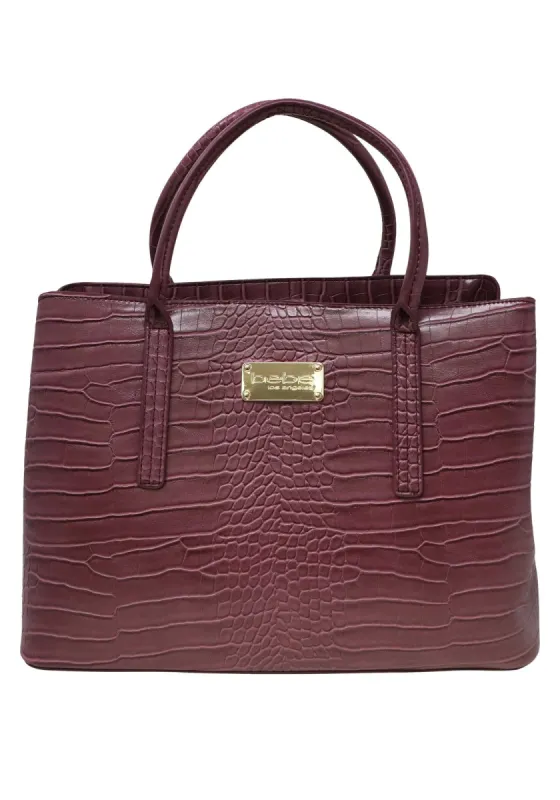 Aubrey Croc Satchel sold by Bebe