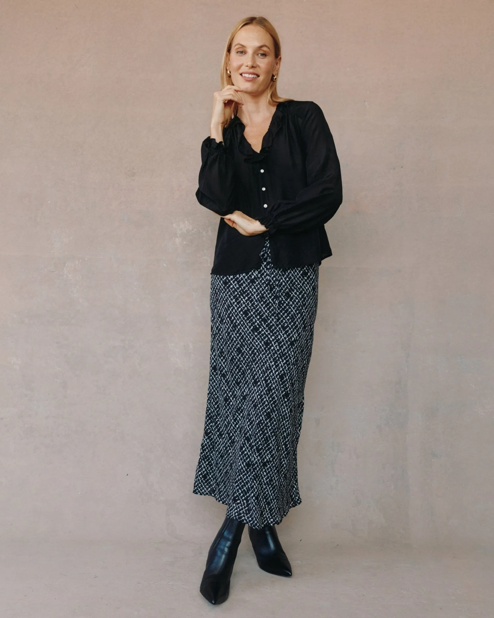 Raglan Ruffle Blouse - Black sold by Bella Dahl