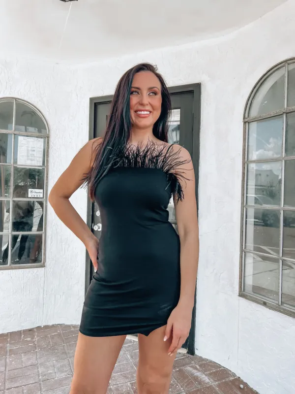 A Touch Of Glamour Feathered Bodycon Dress sold by Bella Rose boutique