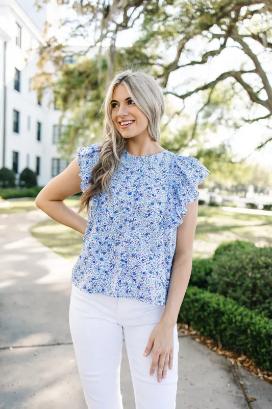 Smell The Daisies Blouse sold by Bella Rose boutique