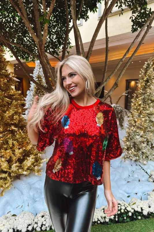 Let Christmas Light Up Your Night Sequin Top sold by Bella Rose boutique