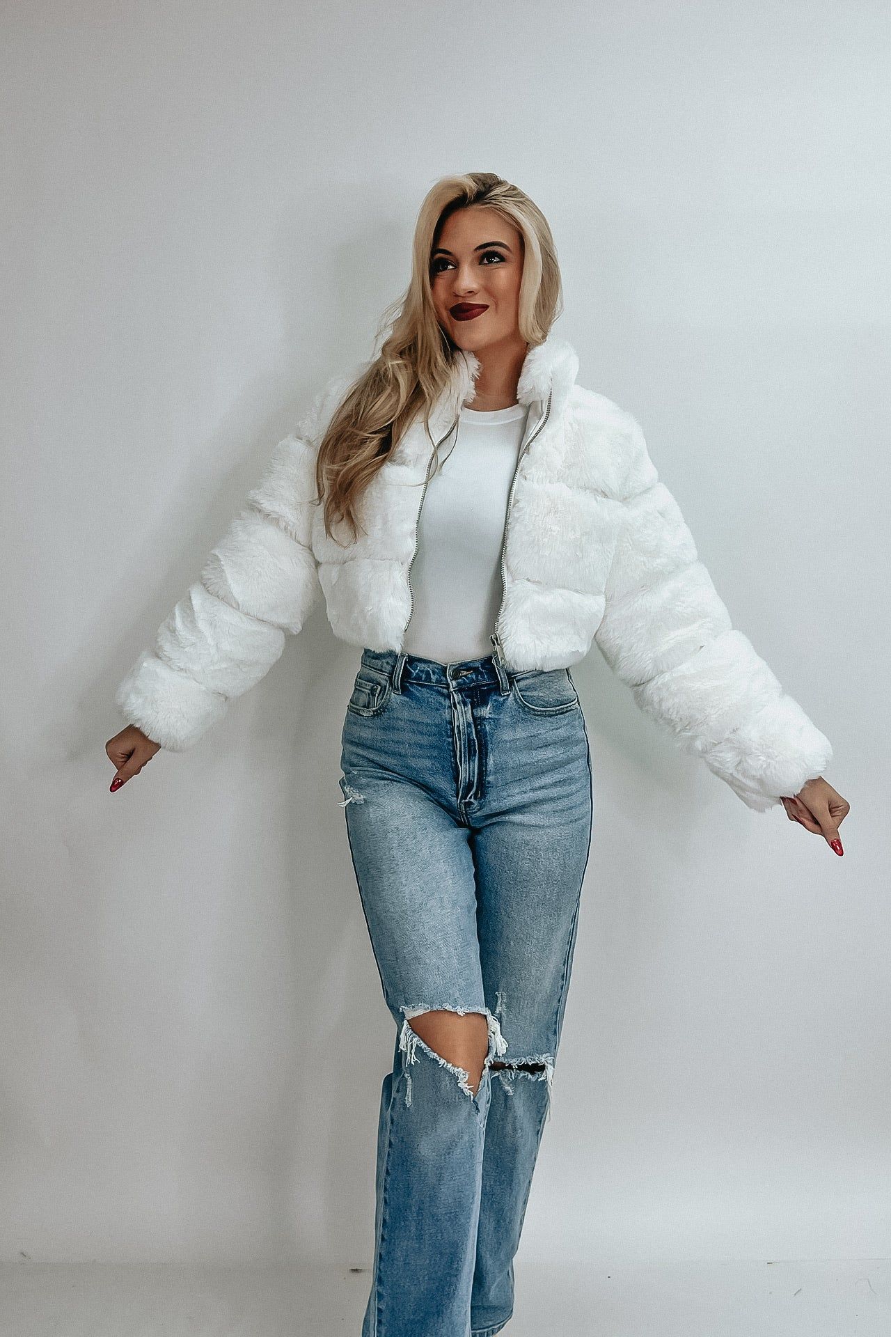 Glam Attitude Faux Fur Jacket sold by Bella Rose boutique