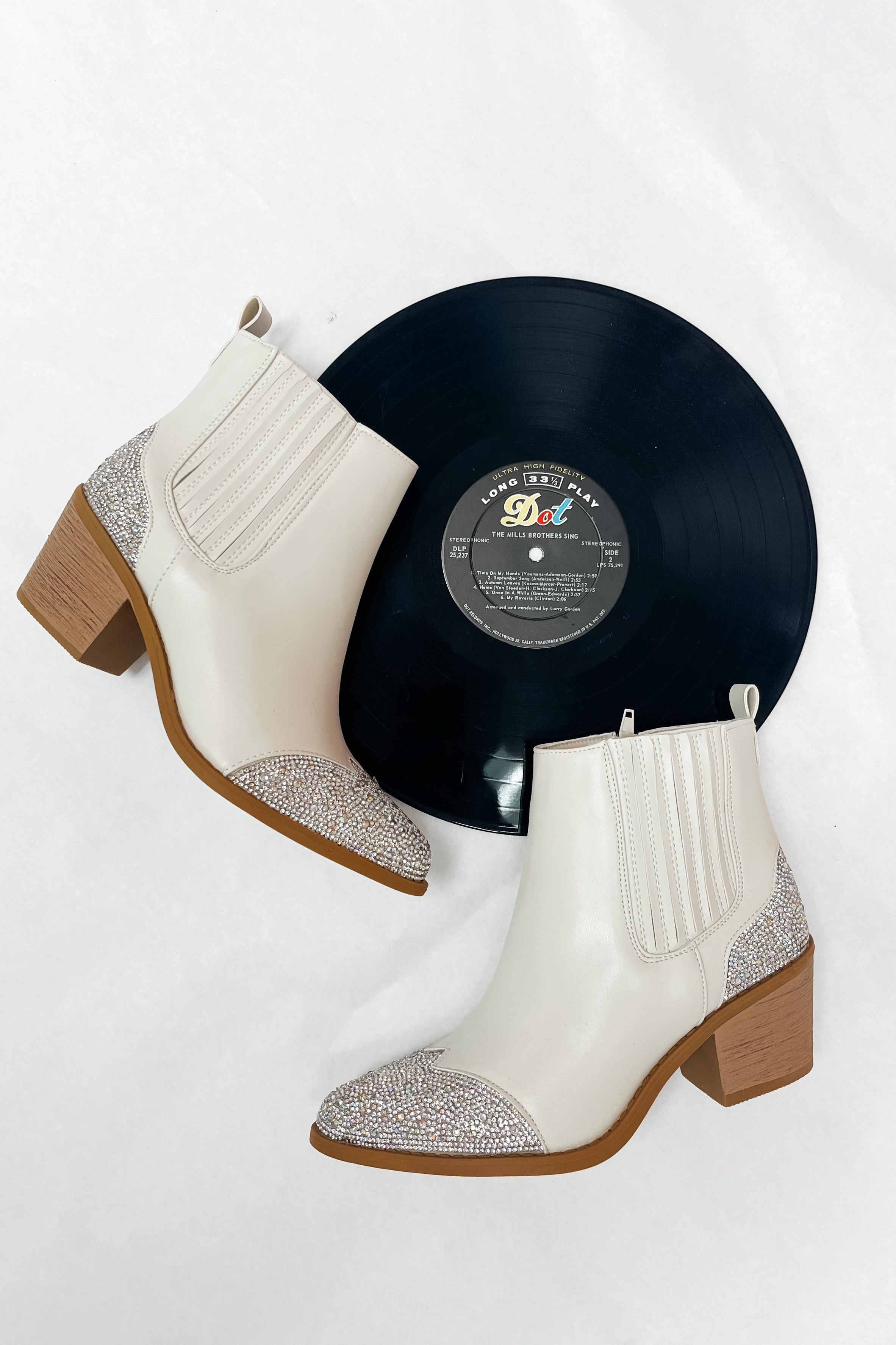 Forever Flashy Bootie sold by Bella Rose boutique