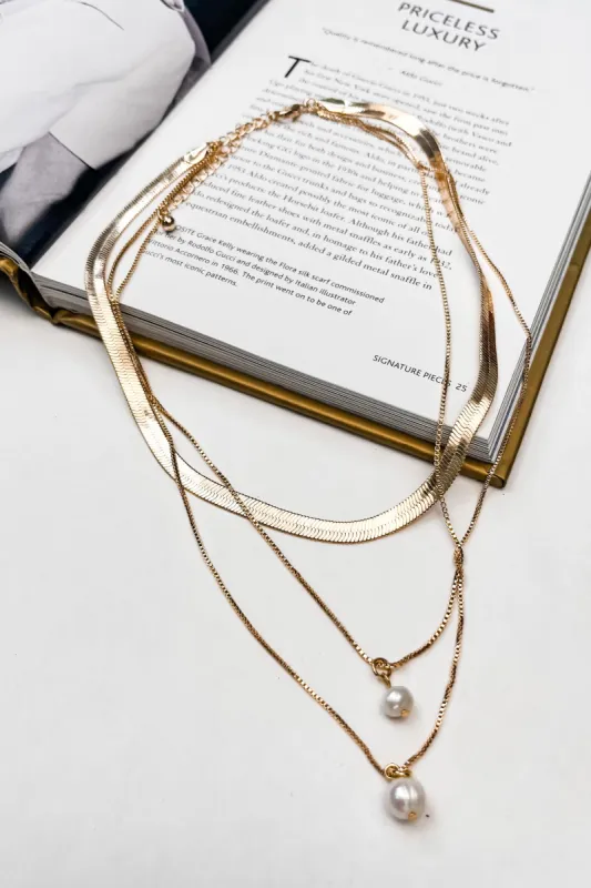 Two-Layered Gold Necklaces With Pearl Dangles sold by Bella Rose boutique