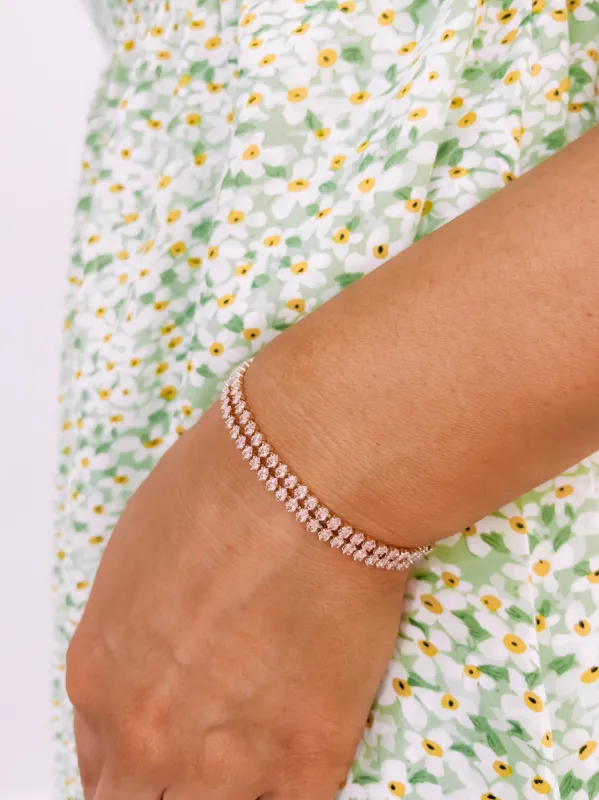 Glimmering Glow Tennis Bracelet sold by Bella Rose boutique