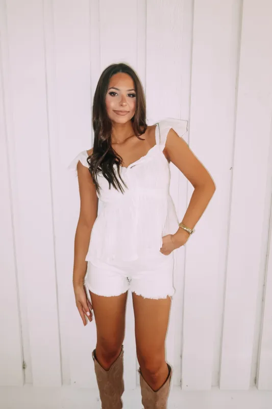Think Of Me Peplum Top sold by Bella Rose boutique