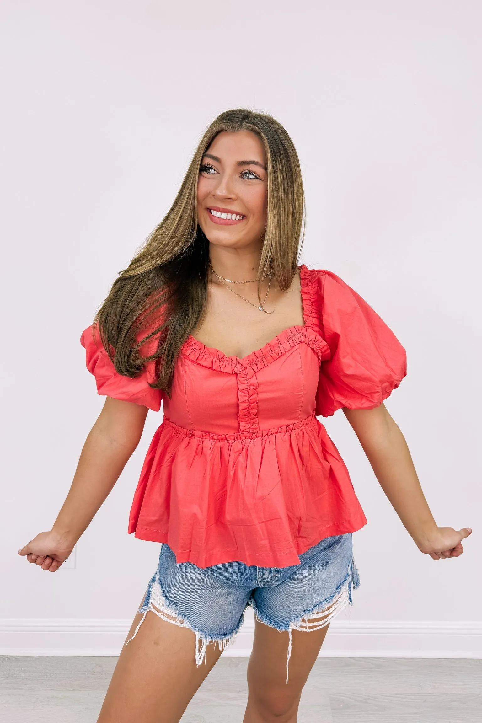 Ruffle Some Feathers Top sold by Bella Rose boutique