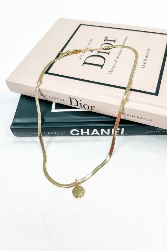 Herringbone Chain Smiley Face Coin Necklace sold by Bella Rose boutique