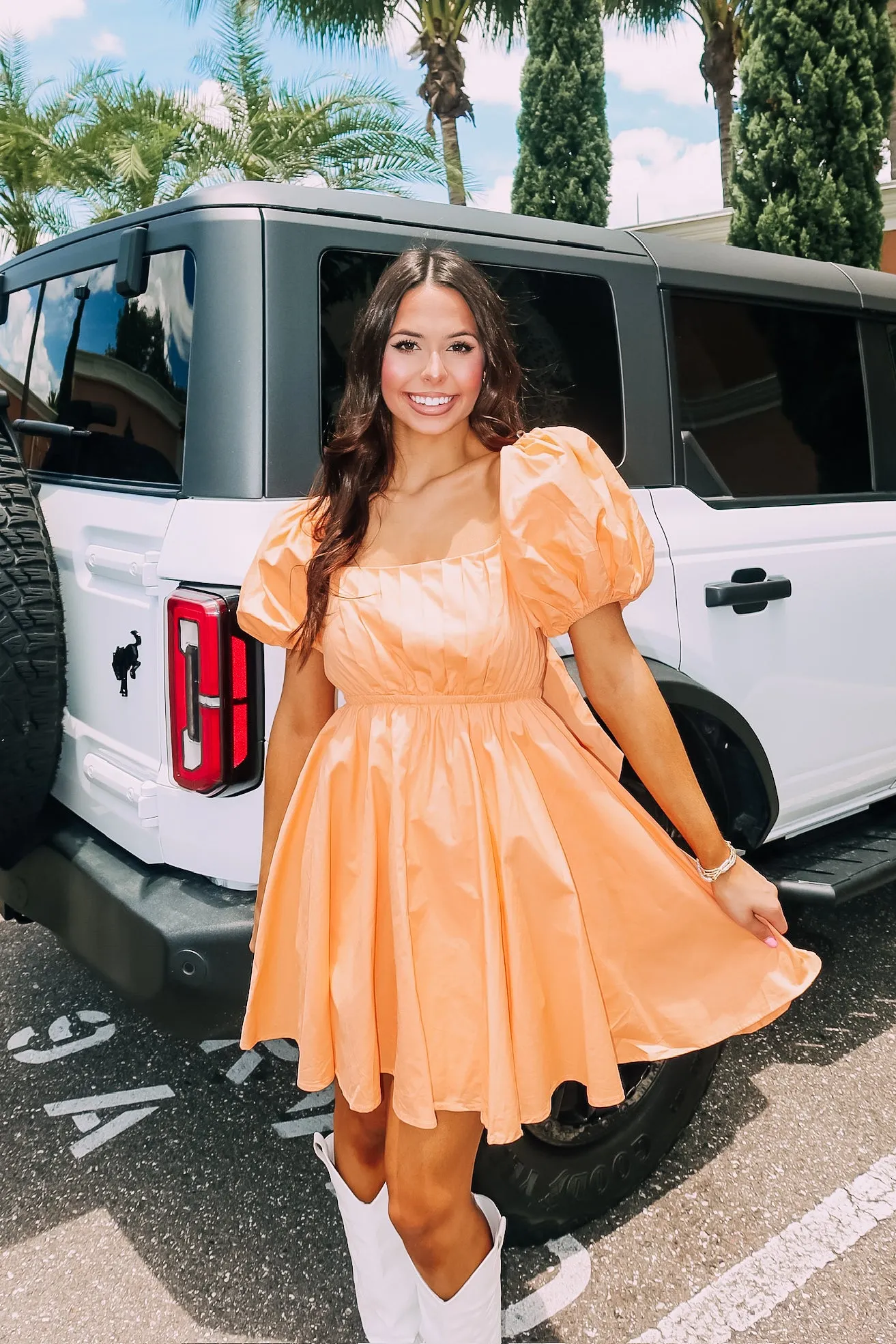 Dancing Through The Summer Pleated Tie-Back Mini Dress sold by Bella Rose boutique