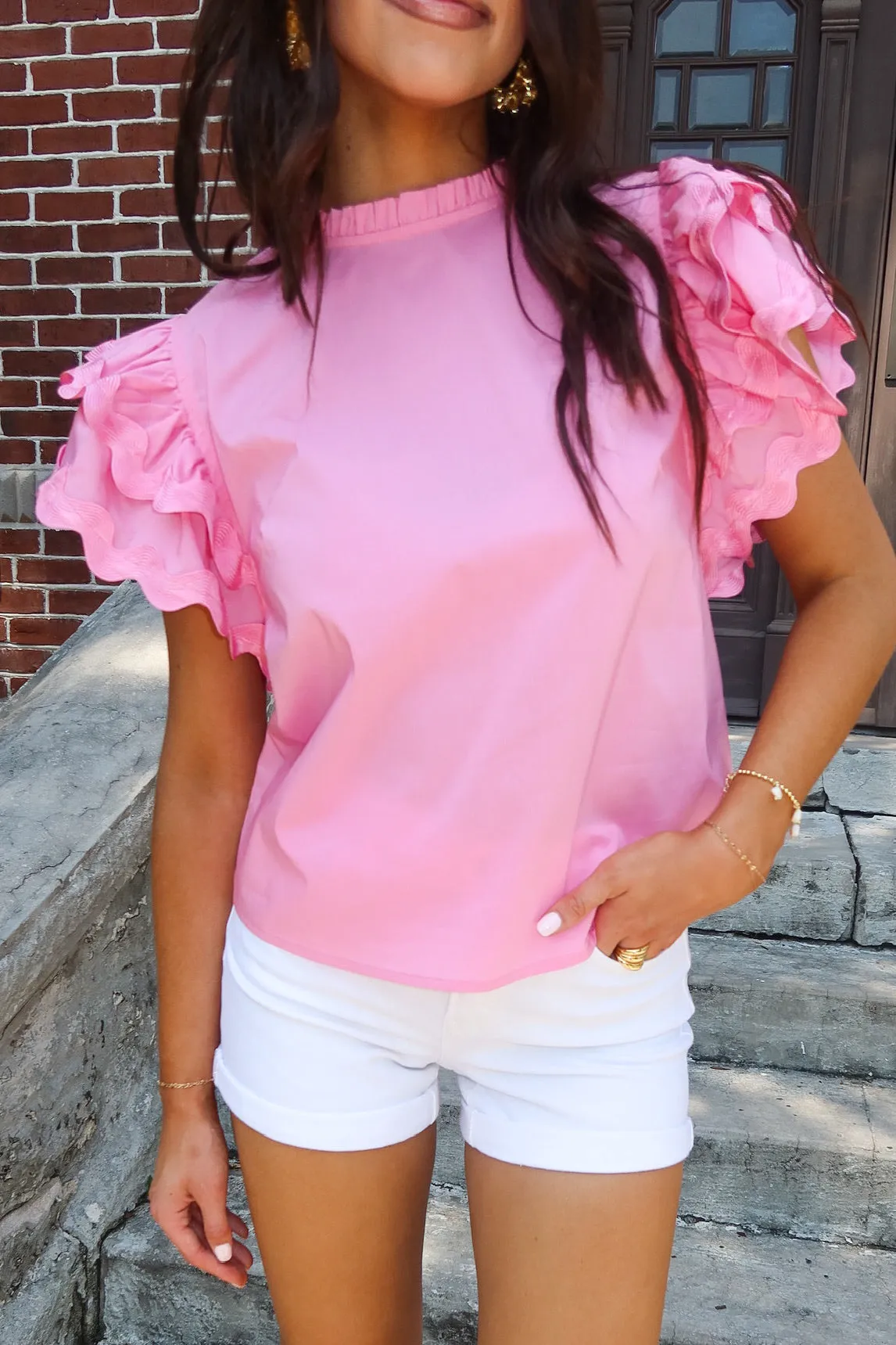 Too Sophisticated Ruffle Top sold by Bella Rose boutique