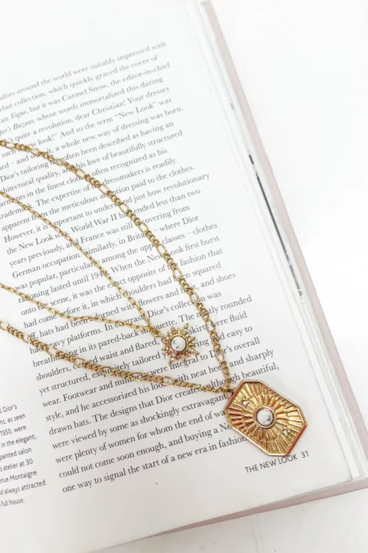 Double Layered Sun & Charm Pendant Necklace sold by Bella Rose boutique