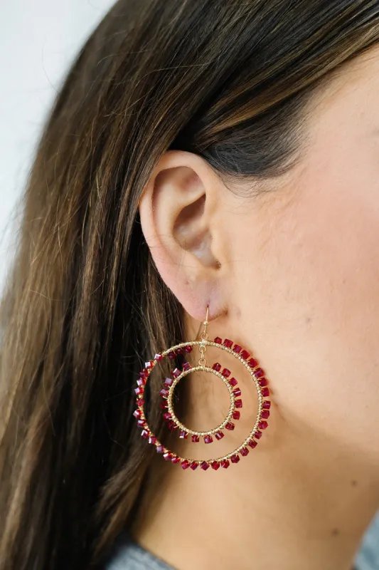 Layered Beaded Circle Cutout Drop Earrings sold by Bella Rose boutique