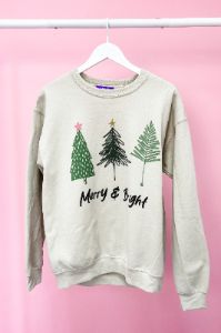 Merry & Bright Graphic Sweatshirt sold by Bella Rose boutique