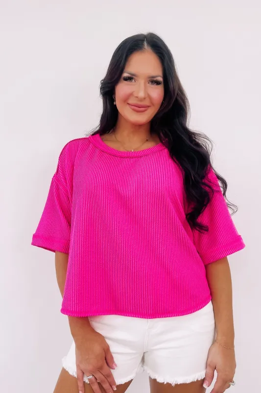 Total Distraction Top sold by Bella Rose boutique