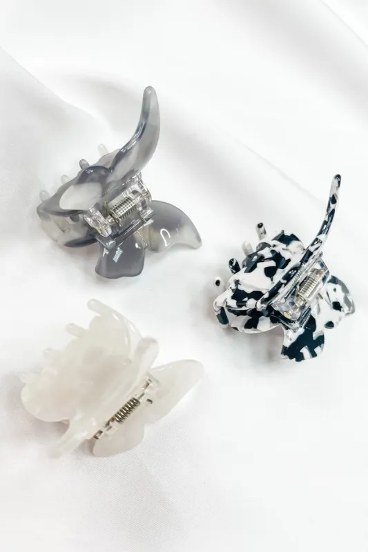 The Shania 3 Piece Printed Butterfly Hair Clip Set sold by Bella Rose boutique