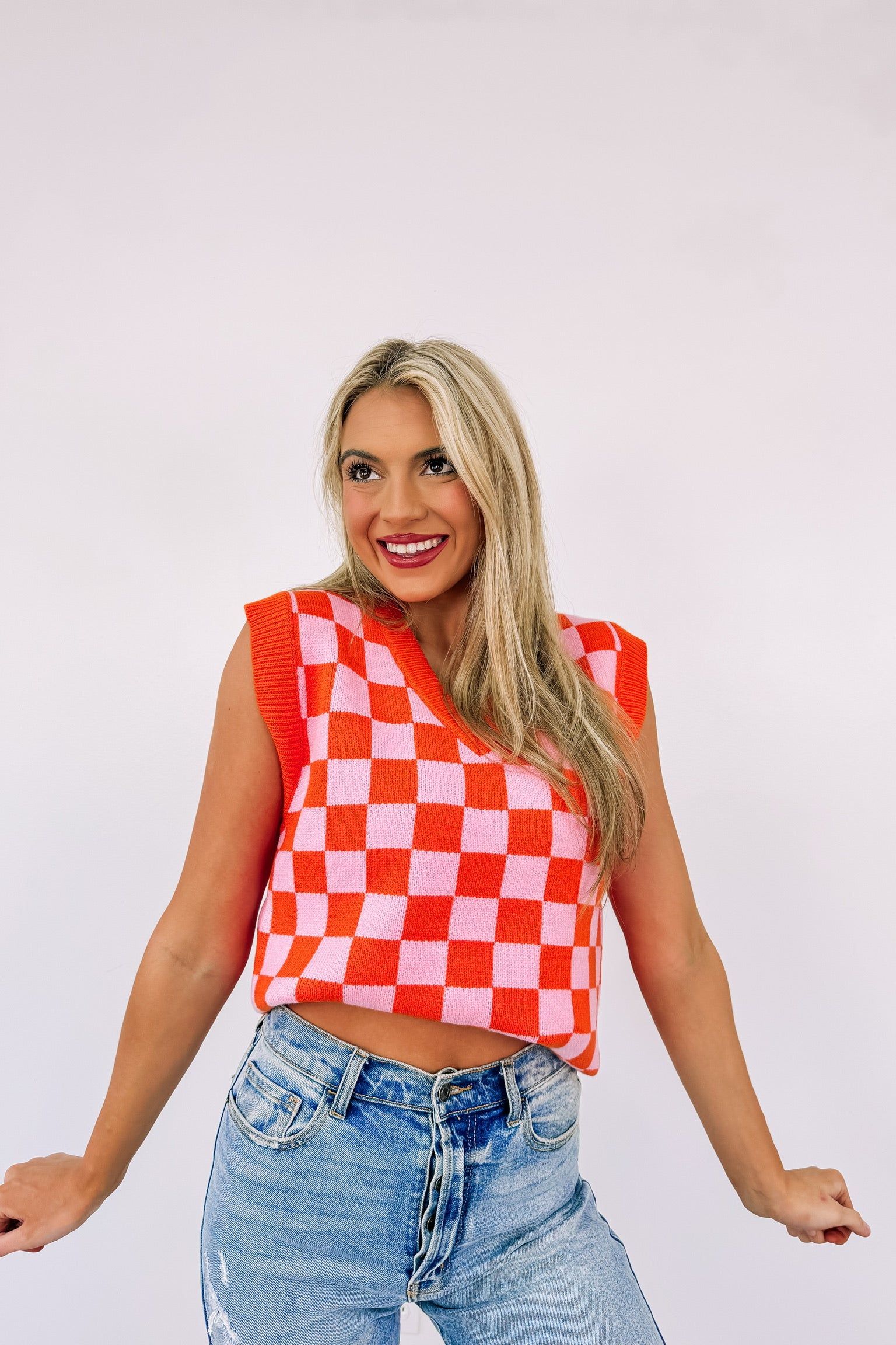 Retro Cutie Checkered Sweater Vest sold by Bella Rose boutique