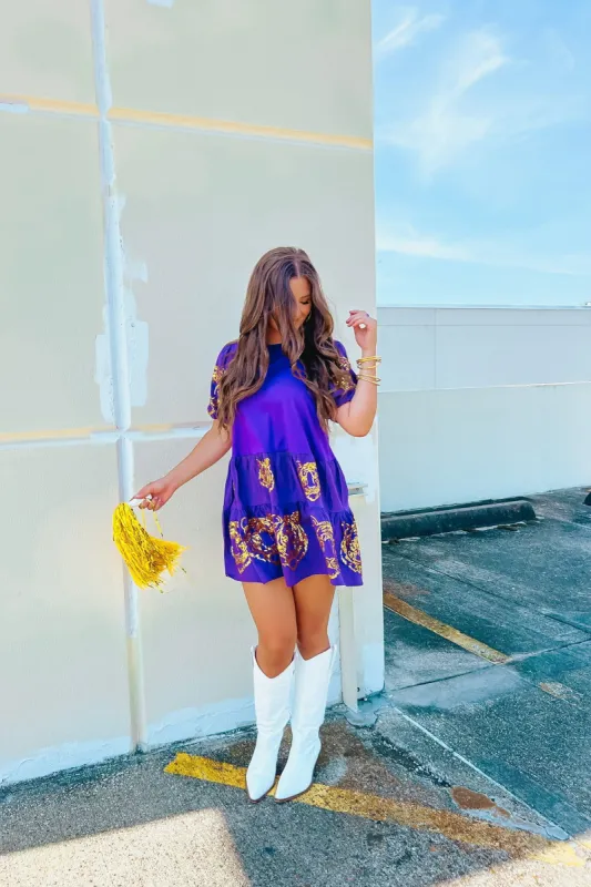 The Tiger Sequin Dress sold by Bella Rose boutique