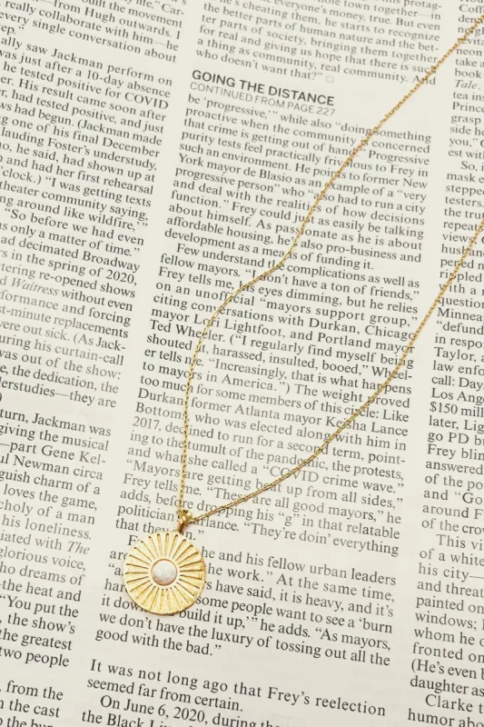 Circle Sunburst Coin Pendant Necklace sold by Bella Rose boutique