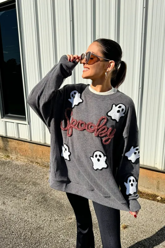 Feeling Spooktacular Tinsel Top sold by Bella Rose boutique