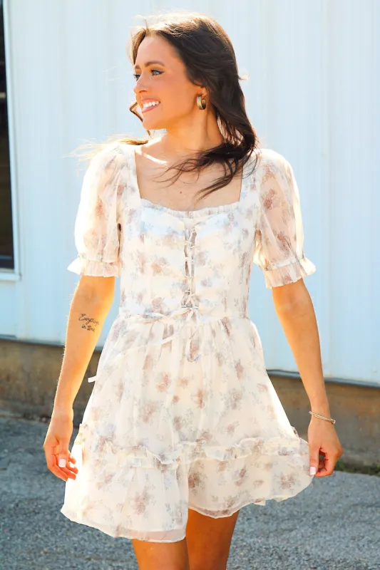 Composed Beauty Floral Mini Dress sold by Bella Rose boutique