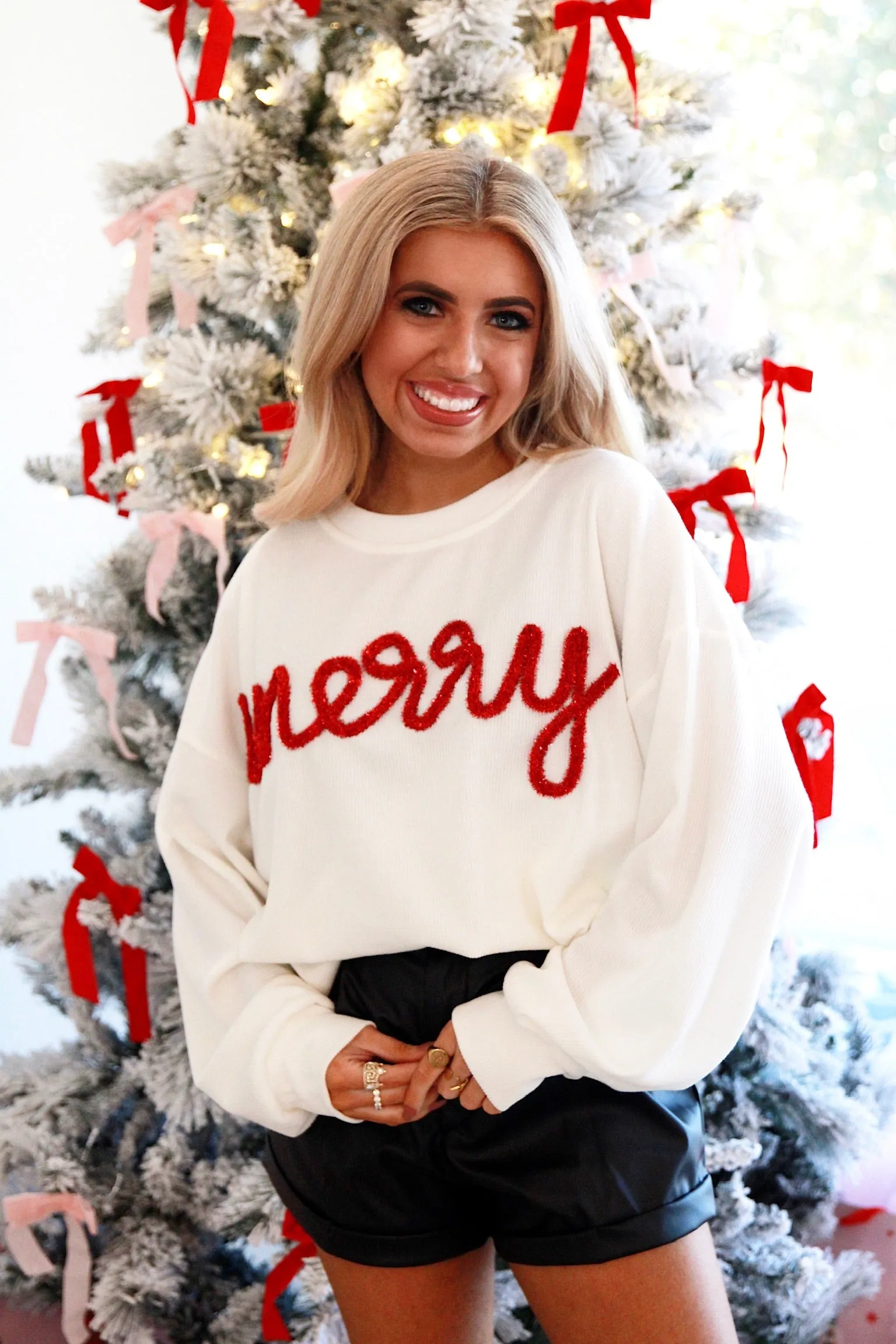 Let's Be Merry Tinsel Rib Top sold by Bella Rose boutique