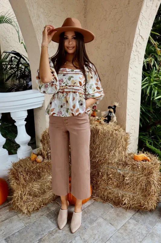 Eye-Catching Sweetie Peplum Top sold by Bella Rose boutique