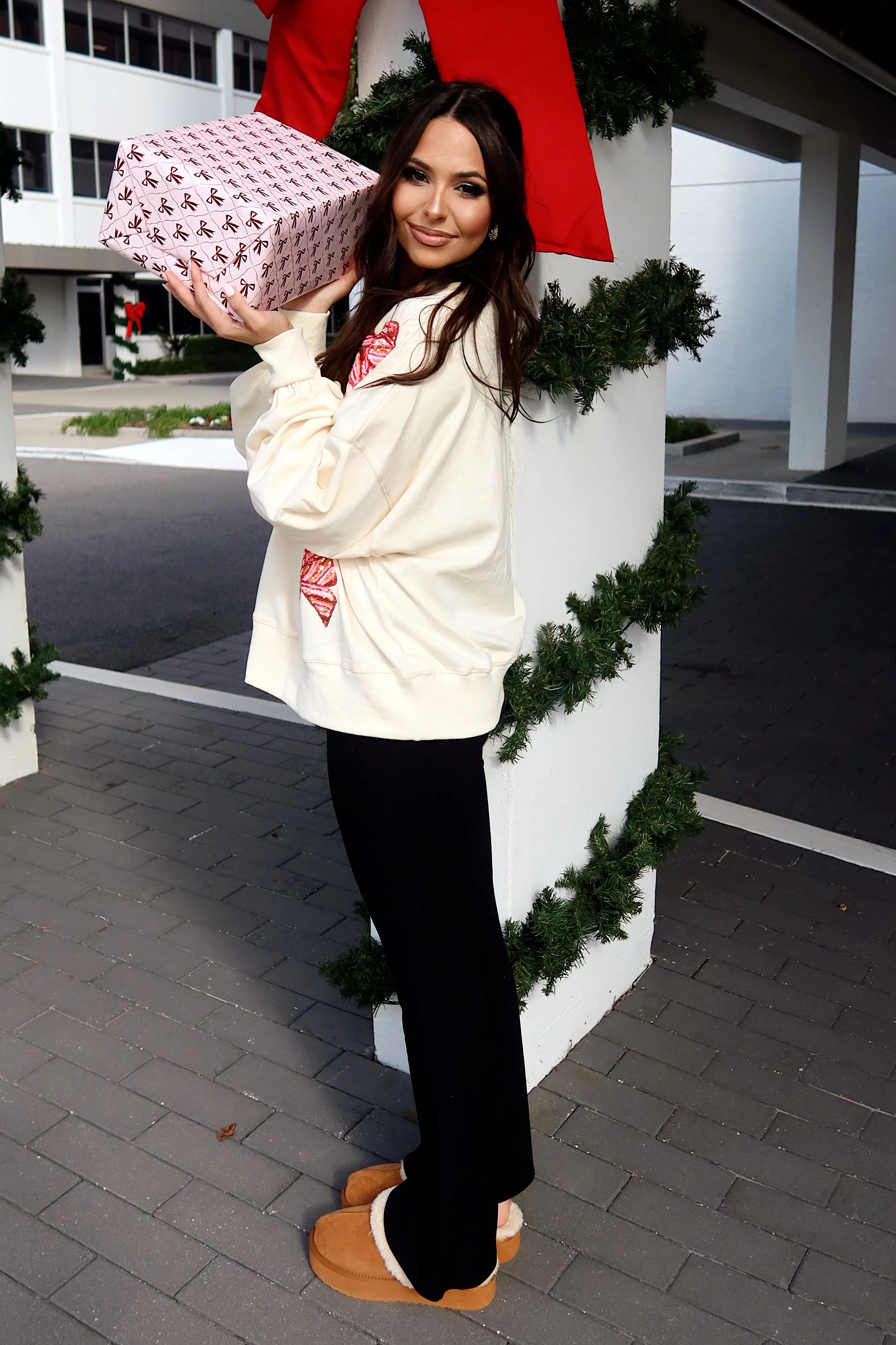 Wrapped In A Bow Oversized Sweatshirt sold by Bella Rose boutique product image thumbnail 3
