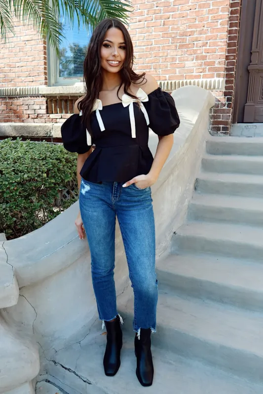 Flirty Feeling Peplum Top sold by Bella Rose boutique