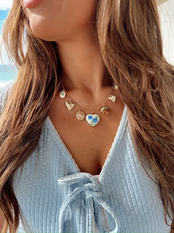 Floral Heart Locket Charm Necklace sold by Bella Rose boutique