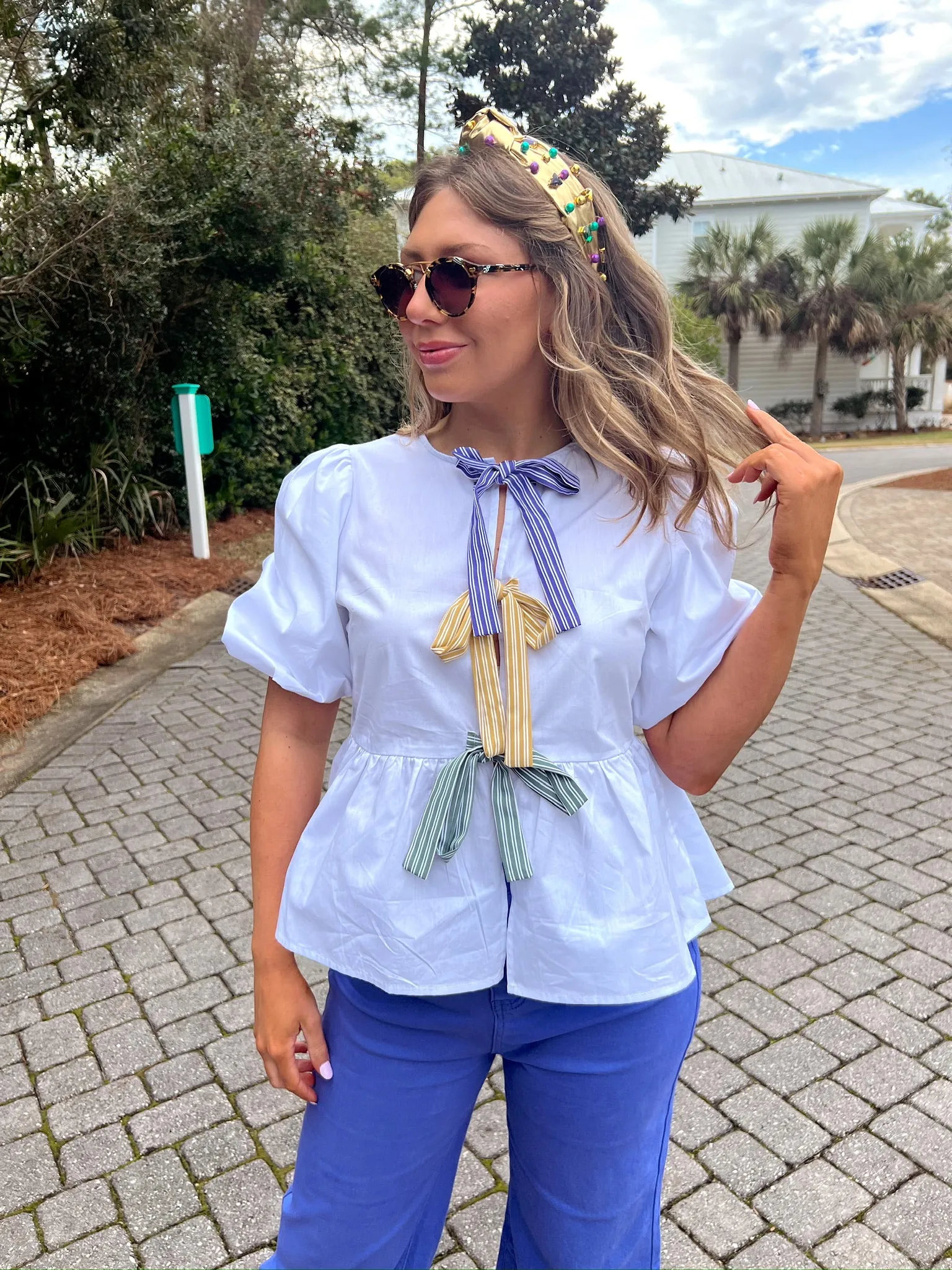 It's A Mardi Party Peplum Top sold by Bella Rose boutique