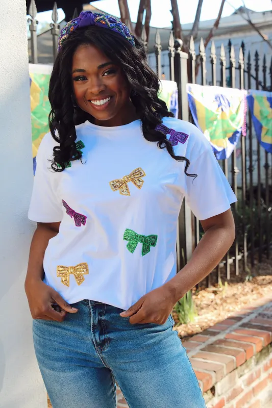 It's Mardi Gras Sequin Bow Tee sold by Bella Rose boutique