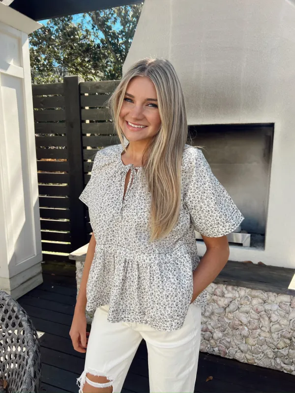Subtle Blooms Floral Blouse sold by Bella Rose boutique