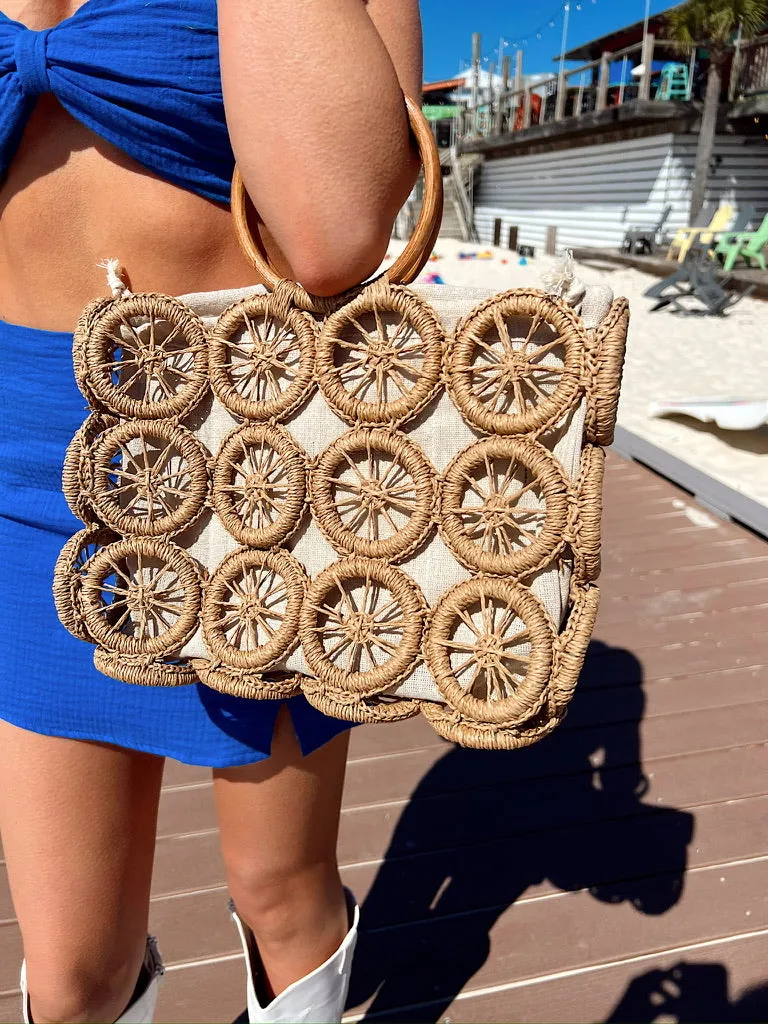 Adventurous Spirit Straw Handbag sold by Bella Rose boutique