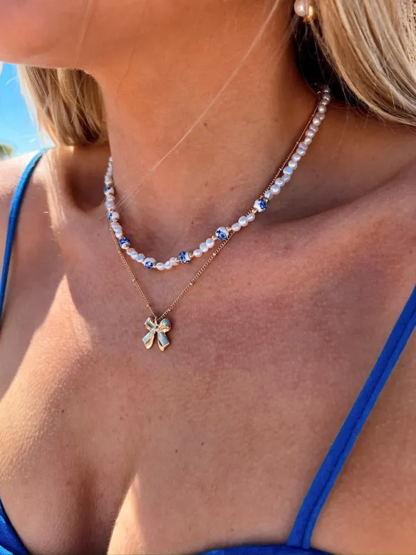 Divine Beauty Bow Layer Necklace sold by Bella Rose boutique