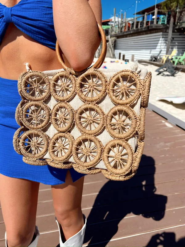 Miles to Go Straw Bag sold by Bella Rose boutique