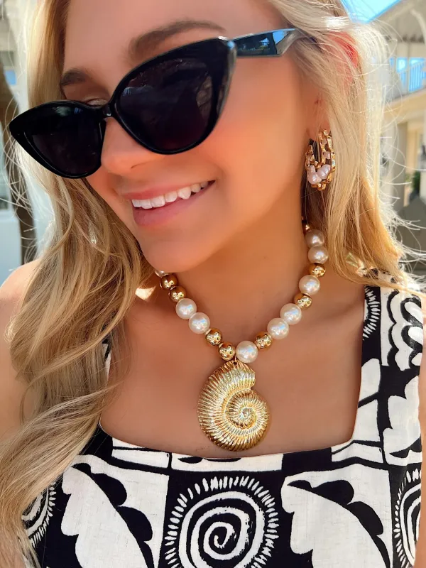 Beachy Charisma Conch Necklace sold by Bella Rose boutique