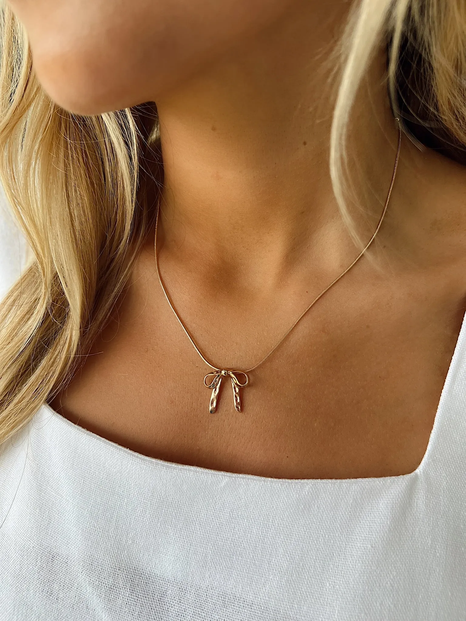 Bow Ribbon Snake Chain Necklace sold by Bella Rose boutique