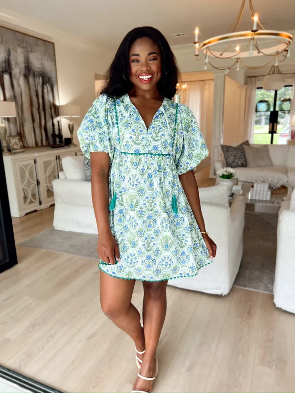 Elegant Darling Floral Mini Dress sold by Bella Rose boutique