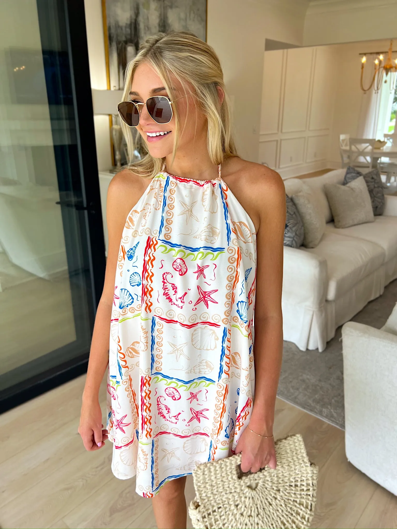 On The Water Halter Mini Dress sold by Bella Rose boutique product image thumbnail 4