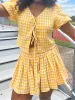 Flirty Nature Gingham Skort sold by Bella Rose boutique